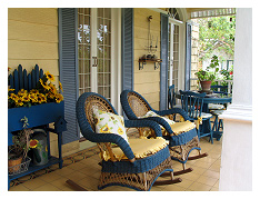 tucked away in the hills of Antipolo is one retired interior designer's dream come true. The matriarch has a knack for theme houses so in her family's sprawling compound, there is an Apple house, a Moo house and a Vegetable house where decoration themes are strictly followed ...this is the porch of the Sunflower House where everything inside is bursting with sunflowers =)