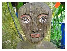 weathered wooden momma welcomes visitors to antonio's farm